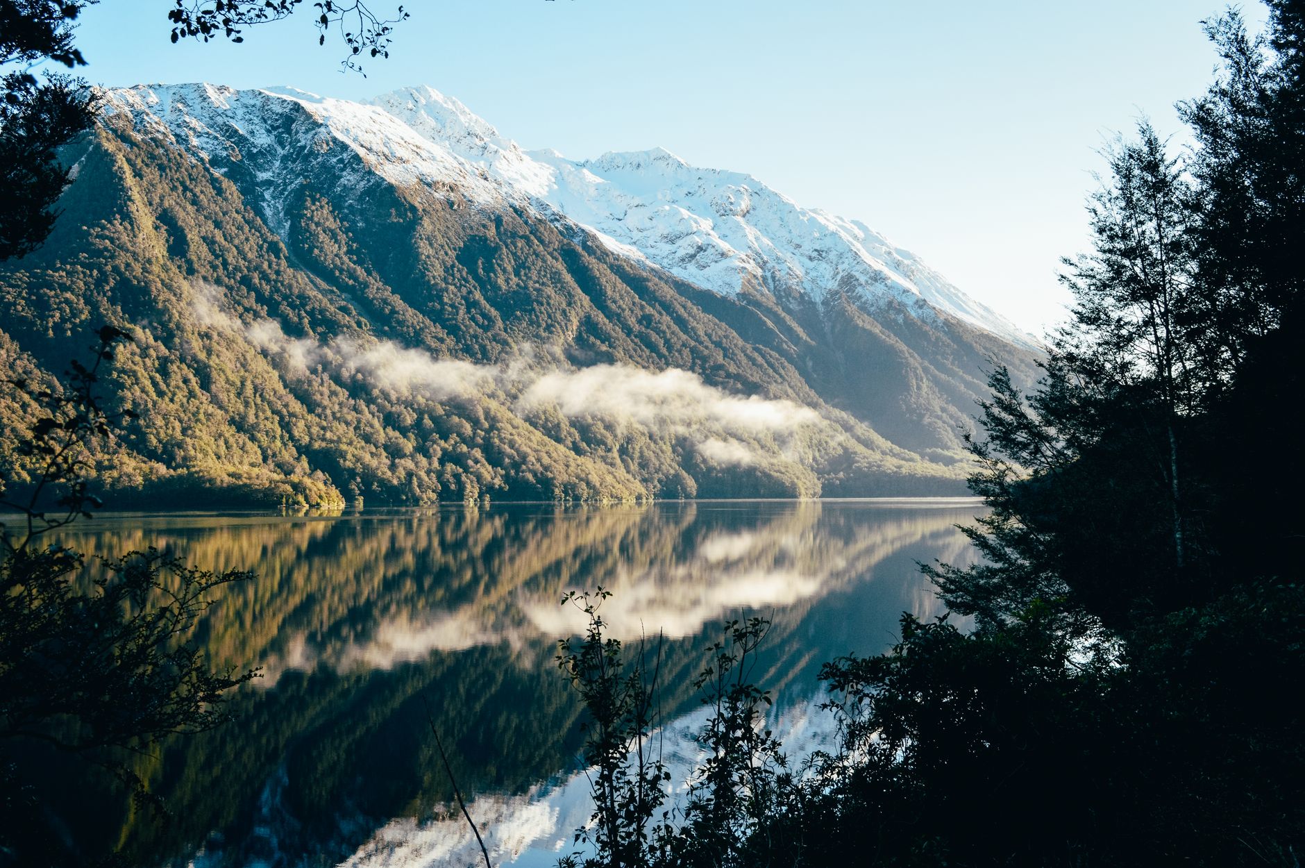 Fiordland New Zealand mountain peak reflected in lake